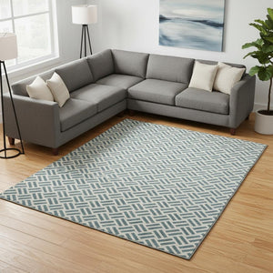 HomeRoots 8' X 10' Teal and Ivory Geometric Area Rug - Durable, Stain-Resistant with UV Protection for Homes 677283