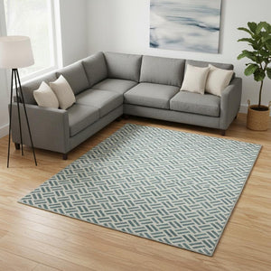 HomeRoots 10' X 14' Teal & Ivory Geometric Area Rug - Washable, UV Protected, Ideal for Homes with Kids & Pets 677285