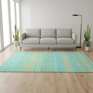 HomeRoots 5' X 8' Vibrant Aqua, Yellow & Peach Striped Washable Area Rug with UV Protection for Busy Homes 677287