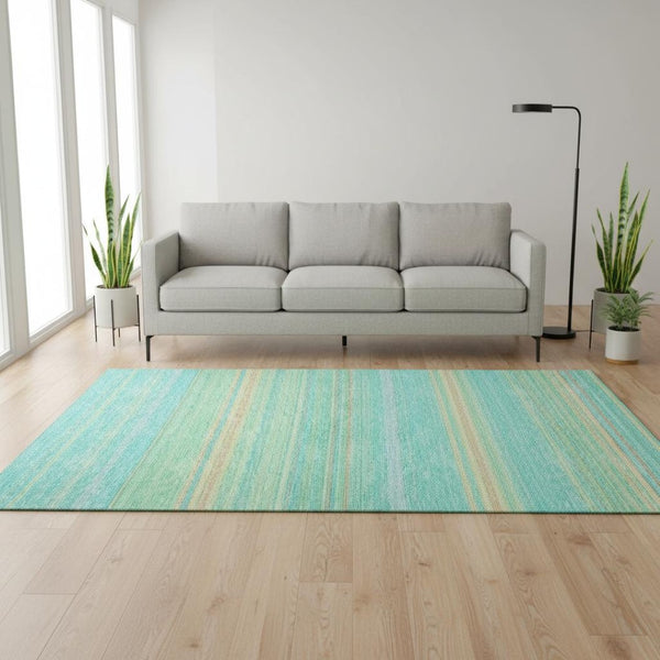 HomeRoots 5' X 8' Vibrant Aqua, Yellow & Peach Striped Washable Area Rug with UV Protection for Busy Homes 677287