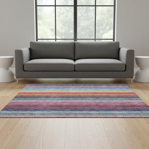 HomeRoots 5' X 8' Vibrant Lavender, Red & Orange Striped Area Rug - Washable, UV Protected for Indoor/Outdoor Use 677305