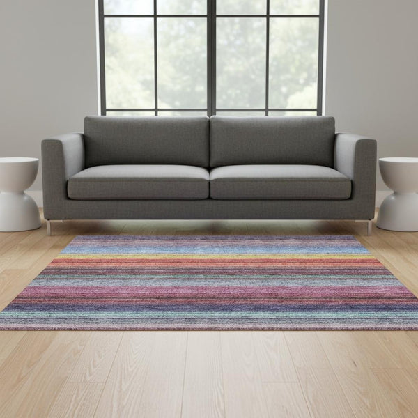 HomeRoots 5' X 8' Vibrant Lavender, Red & Orange Striped Area Rug - Washable, UV Protected for Indoor/Outdoor Use 677305