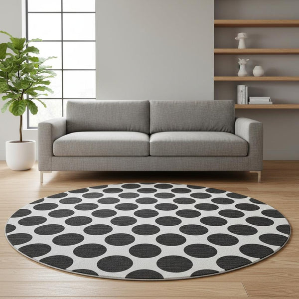 HomeRoots 8' Black And Ivory Polka Dot Round Rug – Durable, Washable, UV-Protected, Perfect for Any Room! 677366