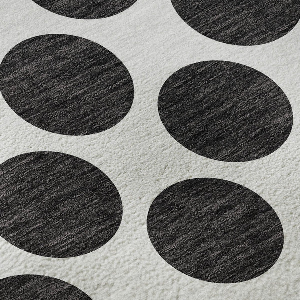 HomeRoots 8' Black And Ivory Polka Dot Round Rug – Durable, Washable, UV-Protected, Perfect for Any Room! 677366