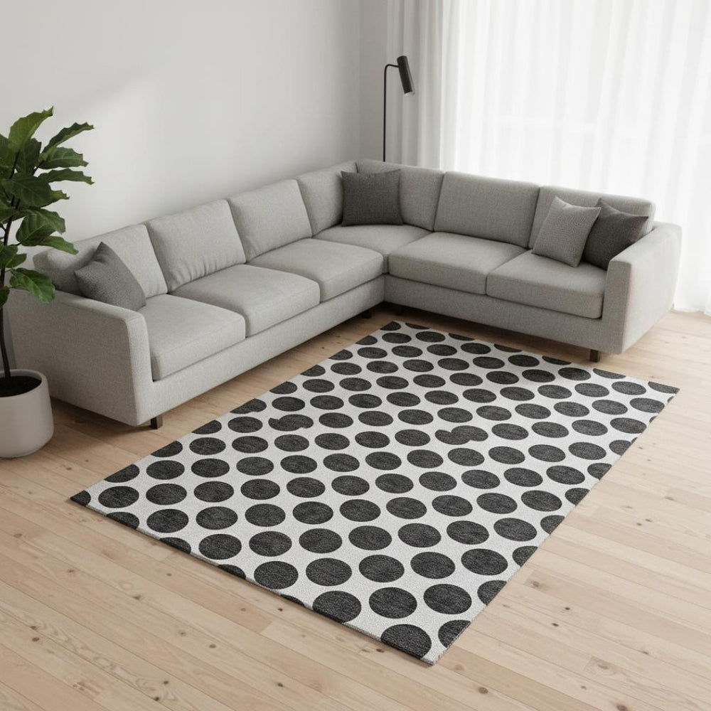 HomeRoots 8' X 10' Playful Black and Ivory Polka Dot Washable Area Rug with UV Protection for Busy Homes 677367