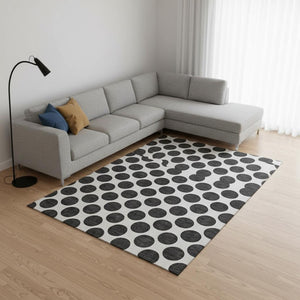 HomeRoots 9' X 12' Washable Black and Ivory Polka Dot Area Rug with UV Protection for High-Traffic Spaces 677368