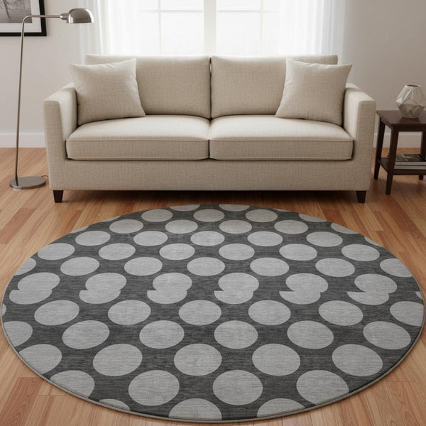 HomeRoots 8' Charcoal and Gray Polka Dot Washable Round Rug - Stylish, Durable, UV Protected for Any Space! 677384