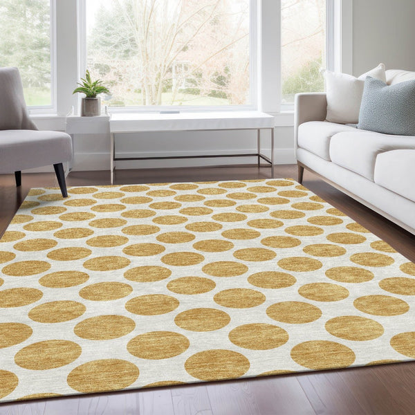 HomeRoots 10' X 14' Gold and Ivory Polka Dot Area Rug - Washable, Durable, UV Protected for Modern Spaces 677393