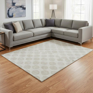 HomeRoots 10' X 14' Ivory and Beige Polka Dot Washable Area Rug with UV Protection for Stylish Spaces 677405