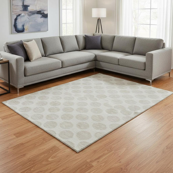HomeRoots 10' X 14' Ivory and Beige Polka Dot Washable Area Rug with UV Protection for Stylish Spaces 677405