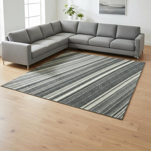 HomeRoots 8' X 10' Striped Washable Area Rug - Durable Black, Gray & Ivory Design with UV Protection & Easy Care 677457