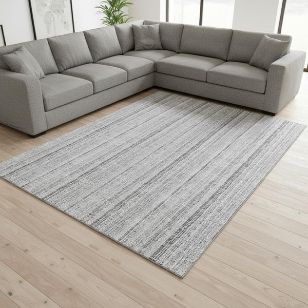 HomeRoots 9' X 12' Silver and Gray Striped Washable Area Rug - UV Protected, Stain Resistant for Busy Homes 677578