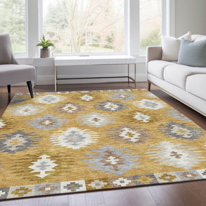 HomeRoots 9' X 12' Southwestern Washable Area Rug in Gold, Gray, and Silver - UV Protected, Durable Design 677620