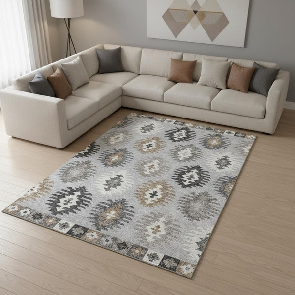 HomeRoots 9' X 12' Southwestern Area Rug in Silver Gray & Taupe - Washable, UV Protected, Pet Friendly Design 677662
