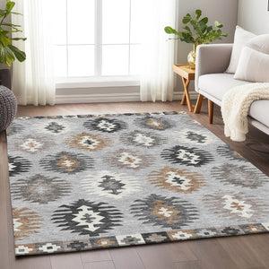 HomeRoots 9' X 12' Southwestern Area Rug in Silver Gray & Taupe - Washable, UV Protected, Pet Friendly Design 677662
