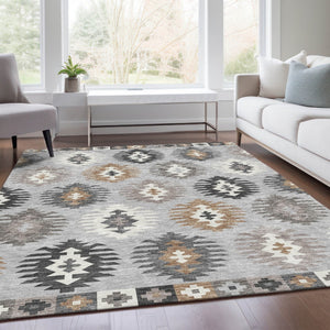 HomeRoots 9' X 12' Southwestern Area Rug in Silver Gray & Taupe - Washable, UV Protected, Pet Friendly Design 677662