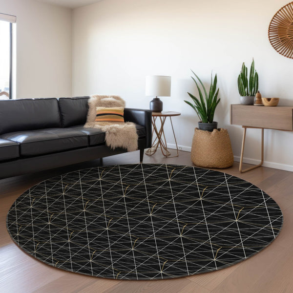 HomeRoots 8' Black And Ivory Geometric Round Rug - Washable, UV Resistant, Stylish for High-Traffic Areas 677852