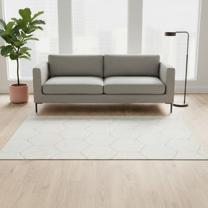 HomeRoots 5' X 8' Ivory And Brown Geometric Washable Area Rug - Stylish, Durable, UV-Protected for Any Space 677881