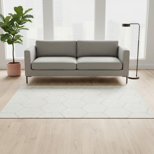 HomeRoots 5' X 8' Ivory And Brown Geometric Washable Area Rug - Stylish, Durable, UV-Protected for Any Space 677881