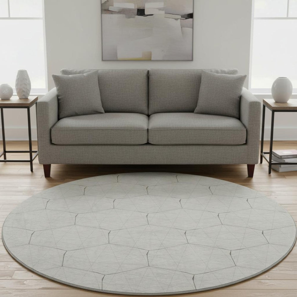 HomeRoots 8' Ivory And Brown Geometric Round Rug - Washable, UV Protected, Durable for Indoor & Outdoor Use 677882