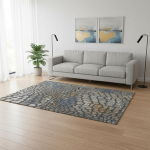 HomeRoots 5' X 8' Abstract Geometric Washable Area Rug in Charcoal, Copper & Blue - UV Protected & Stain Resistant 677917