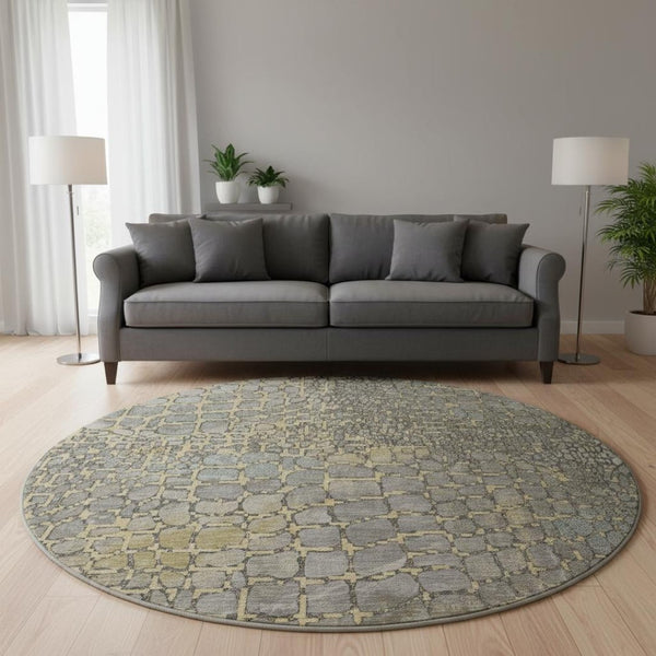 HomeRoots 8' Gold Gray and Silver Abstract Geometric Round Rug - Washable, UV Protected, Perfect for Homes! 677930
