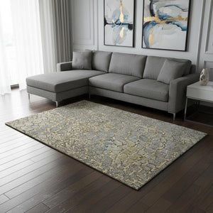 HomeRoots 9' X 12' Gold Gray Silver Abstract Area Rug - Washable, Stain-Resistant, UV Protected, Durable Design 677932