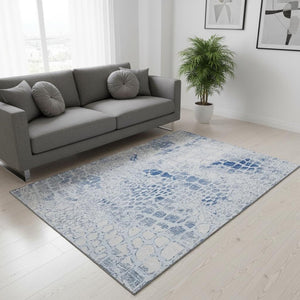 HomeRoots 5' X 8' Sky Blue and Ivory Abstract Geometric Area Rug - Washable, UV-Protected, Stylish & Durable! 677959