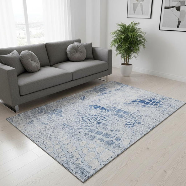 HomeRoots 5' X 8' Sky Blue and Ivory Abstract Geometric Area Rug - Washable, UV-Protected, Stylish & Durable! 677959