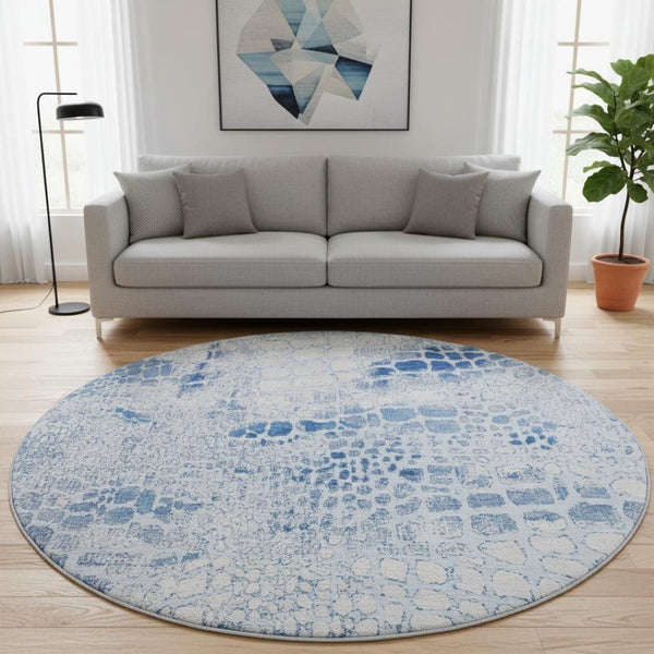 HomeRoots 8' Sky Blue and Ivory Geometric Washable Round Rug with UV Protection for Stylish Living Spaces 677960