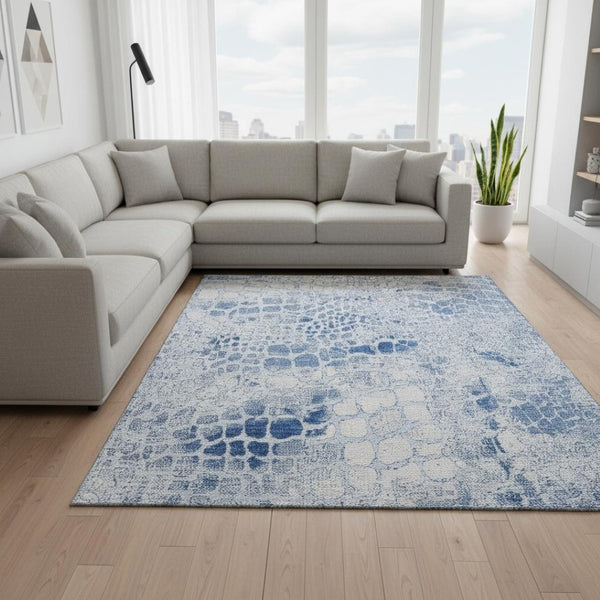HomeRoots 9' X 12' Sky Blue and Ivory Abstract Area Rug - Washable, UV Protected, Perfect for High-Traffic Homes 677962