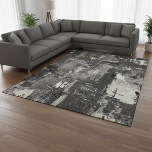 HomeRoots 9' X 12' Black And Ivory Abstract Area Rug – Washable, UV Protected, Perfect for High-Traffic Spaces! 677980