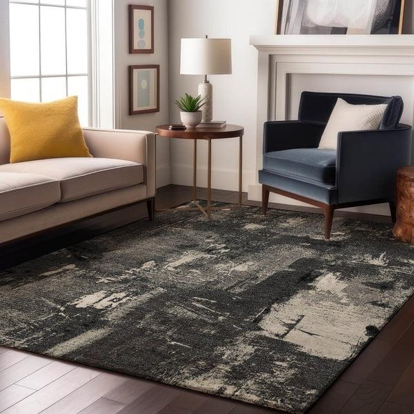 HomeRoots 9' X 12' Black And Ivory Abstract Area Rug – Washable, UV Protected, Perfect for High-Traffic Spaces! 677980