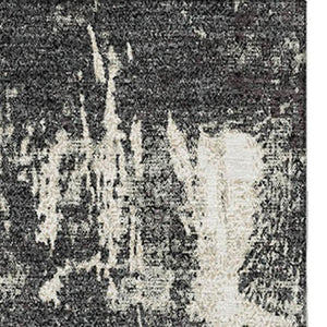 HomeRoots 9' X 12' Black And Ivory Abstract Area Rug – Washable, UV Protected, Perfect for High-Traffic Spaces! 677980