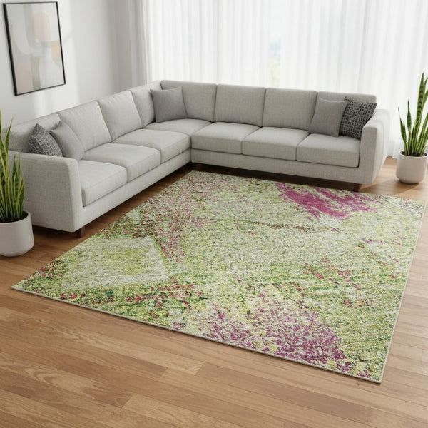 HomeRoots 10' Vibrant Abstract Area Rug in Lime Green, Pink & Yellow - Washable, UV-Protected, Kid & Pet Friendly 678011
