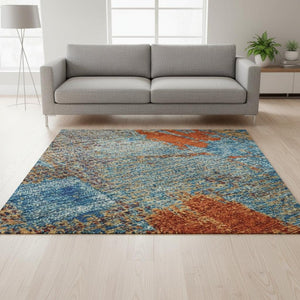 HomeRoots 5' Washable Navy Blue, Orange & Teal Abstract Area Rug with UV Protection for Modern Homes & Families 678013