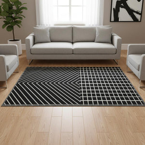 HomeRoots 5' X 8' Black And Ivory Geometric Area Rug - Stylish, Washable, UV-Protected, Perfect for Any Space 678037