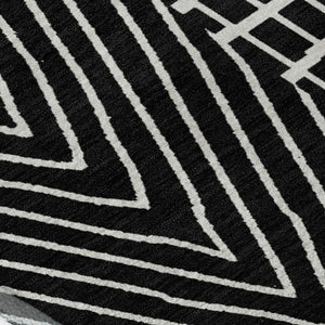 HomeRoots 5' X 8' Black And Ivory Geometric Area Rug - Stylish, Washable, UV-Protected, Perfect for Any Space 678037