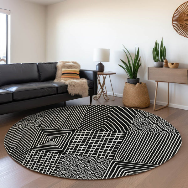 HomeRoots 8' Black and Ivory Geometric Washable Round Rug - Durable, Stylish, UV-Protected for Family Spaces 678038