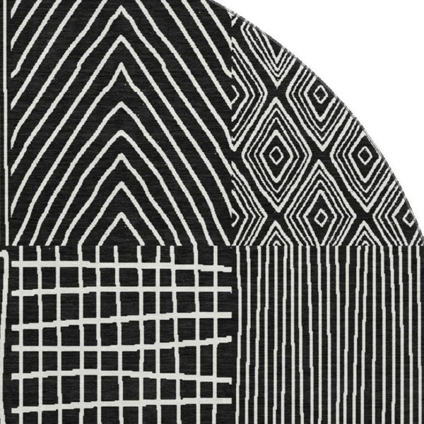 HomeRoots 8' Black and Ivory Geometric Washable Round Rug - Durable, Stylish, UV-Protected for Family Spaces 678038