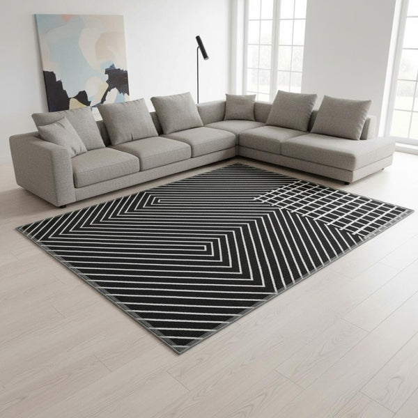HomeRoots 9' X 12' Black and Ivory Geometric Area Rug - Washable, UV Protected, Durable for Busy Homes! 678040