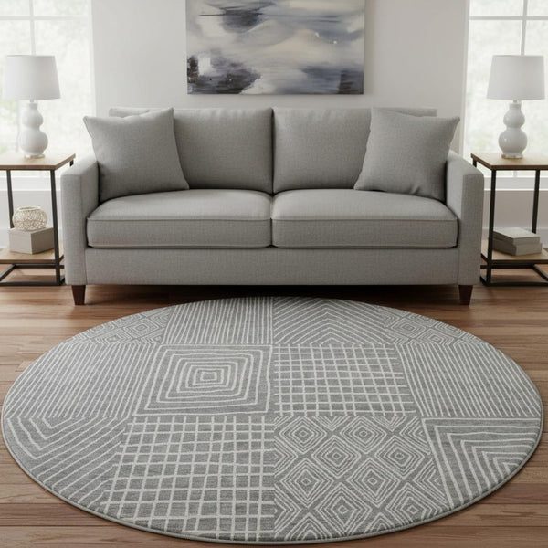 HomeRoots 8' Gray and Ivory Geometric Round Rug - Washable, UV Protected, Perfect for High-Traffic Areas! 678068
