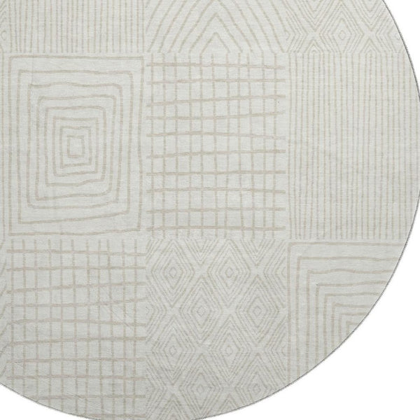 HomeRoots 8' Ivory and Cream Geometric Round Rug - Washable, UV-Protected, Stylish Comfort for Any Space 678074