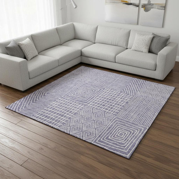 HomeRoots 8' X 10' Stylish Lavender and Ivory Geometric Area Rug – Washable, UV Protected, Family-Friendly Design 678081
