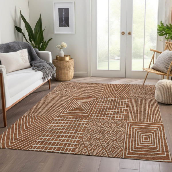HomeRoots 5' X 8' Stylish Rust and Ivory Geometric Washable Area Rug with UV Protection for Modern Homes 678097