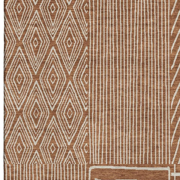 HomeRoots 5' X 8' Stylish Rust and Ivory Geometric Washable Area Rug with UV Protection for Modern Homes 678097