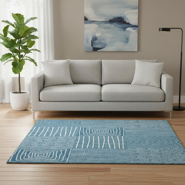 HomeRoots 5' X 8' Stylish Teal and Ivory Geometric Washable Area Rug with UV Protection for Everyday Living 678109