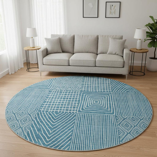 HomeRoots 8' Teal and Ivory Geometric Round Rug – Stylish, Washable, UV-Protected for High-Traffic Spaces! 678110