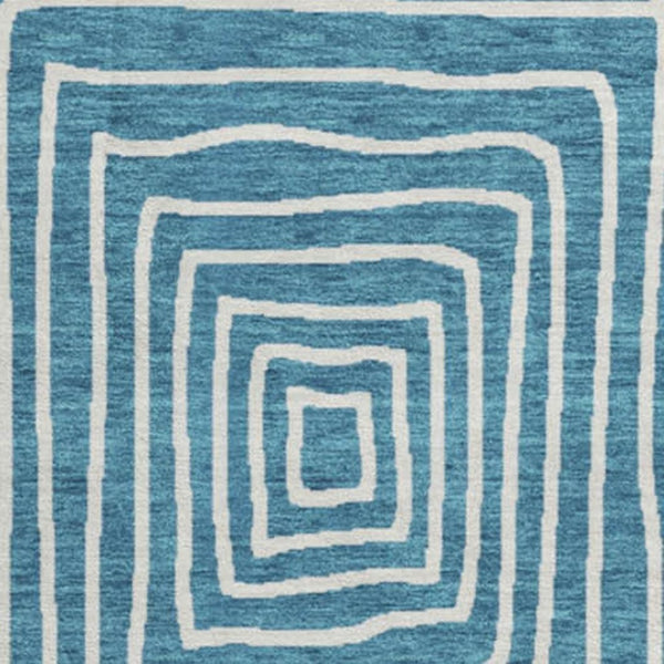 HomeRoots 8' Teal and Ivory Geometric Round Rug – Stylish, Washable, UV-Protected for High-Traffic Spaces! 678110