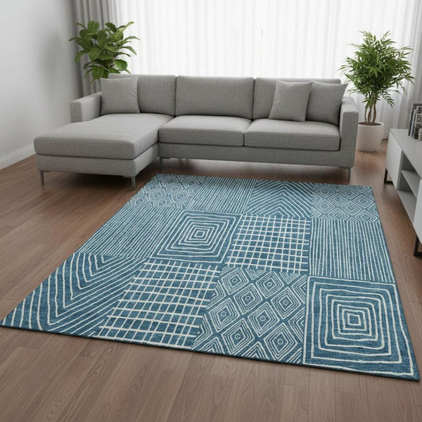 HomeRoots 10' X 14' Teal and Ivory Geometric Area Rug – Durable, Washable, UV-Protected for Modern Spaces 678113